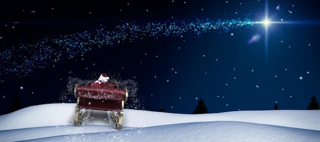 Kerstman die 's nachts met zijn slee tegen vallende ster over bos vliegt