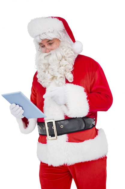 Kerstman met behulp van digitale tablet