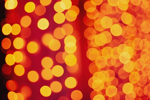 Kerstmis glanzende bokeh in gele gouden kleuren nieuwjaarsverlichting Seizoensgebonden vakantieachtergrond