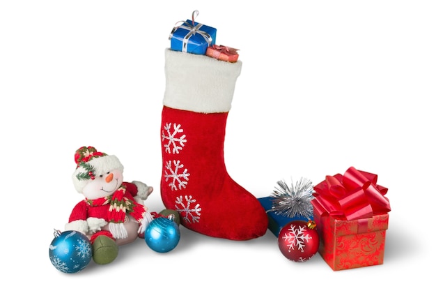 Kerstsok met ornamenten en kleine cadeautjes