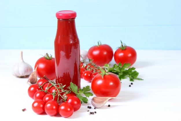 Ketchup on the table tomato sauce fresh tomatoes