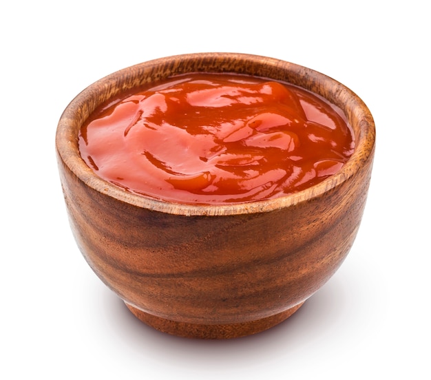 Ketchup in ciotola di legno