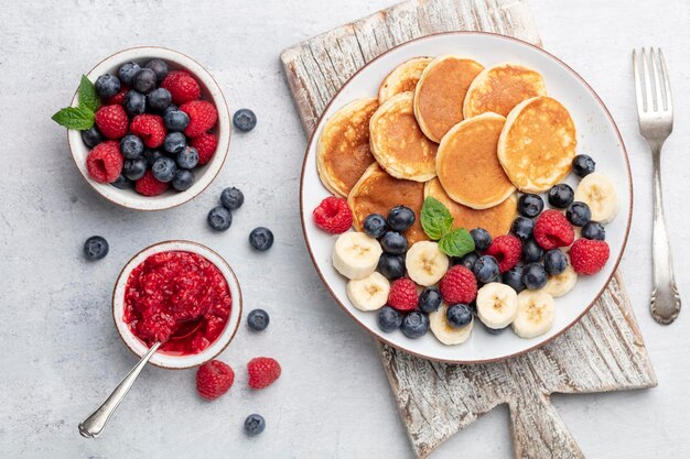 Keto diet pancakes made or almond flour served with berries