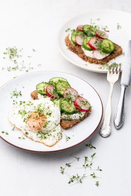 Keto Toasts with cucumber egg mozzarella and microgreens