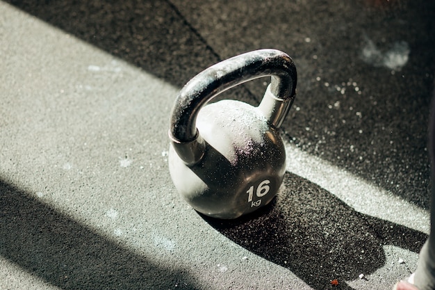 Kettle bells on the floor.