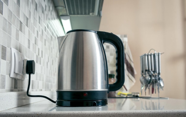 Photo kettle closeup in the kitchen