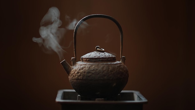 A kettle with a steam rising from it