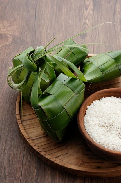 Photo ketupat or rice dumpling is a local delicacy during eid alfitr natural rice casing