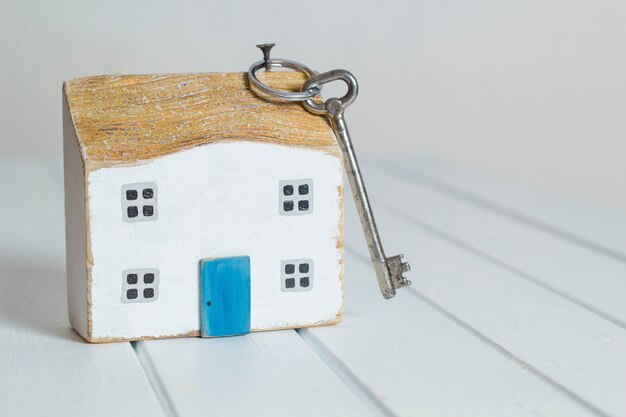 Key and house, the concept of real estate acquisition, mortgage. 