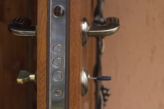 Key in the keyhole in the wooden door