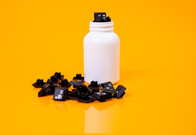 Keyboard button in glass in jar in bucket on orange background