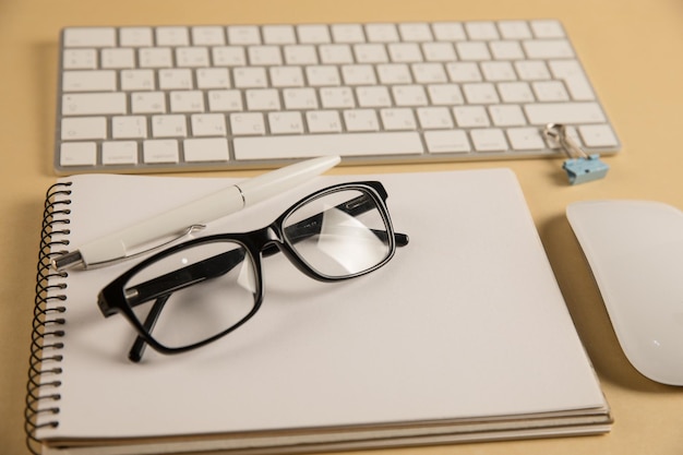 Photo keyboard glasses and notepad