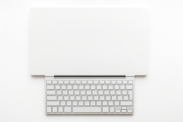 Photo keyboard laptop spiral notepad on white desk with space for writing text