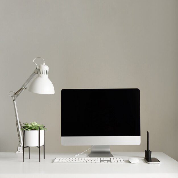 Keyboard, mouse, computer display with black blank screen.