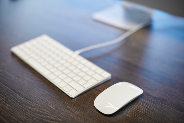 Keyboard and mouse on an office table