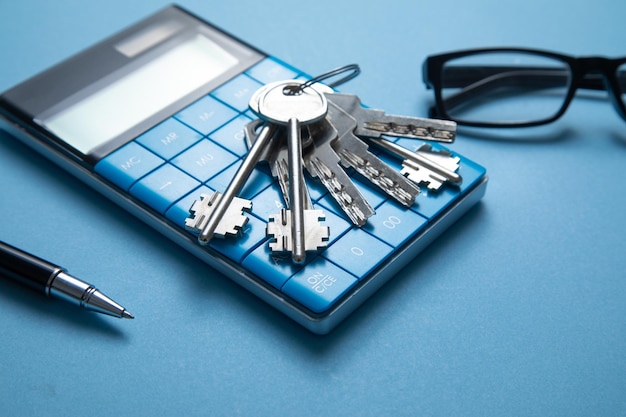 Keys on calculator on the blue background