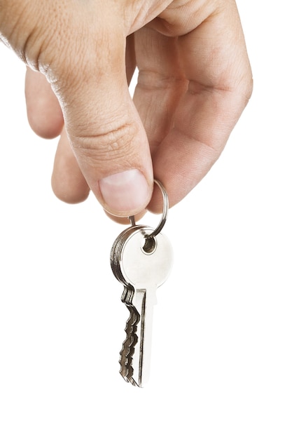 Keys in hand isolated on white