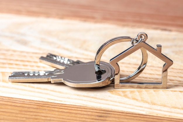 Keys and keychains on wood