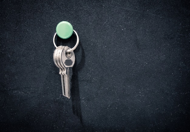 Keys pin on black rubber board