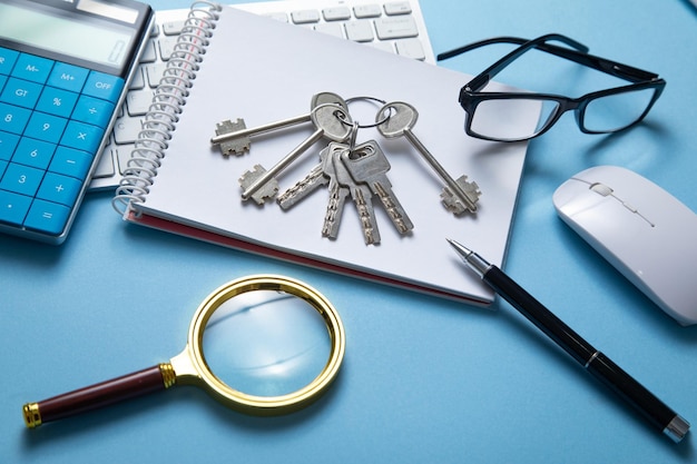 Keys with a business objects on the blue background