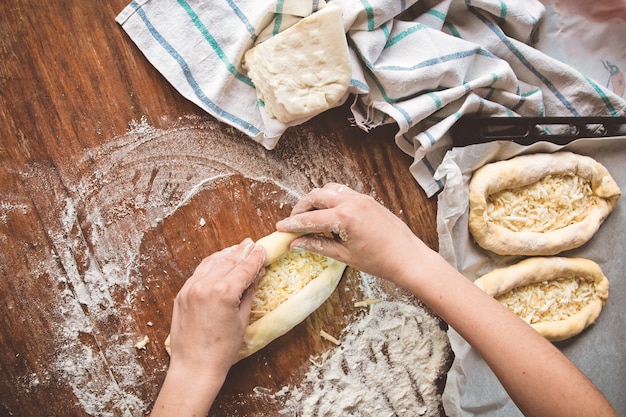 Khachapuri with cheese is molded 