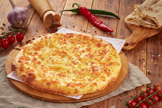 Khachapuri with cheese, traditional Georgian cuisine