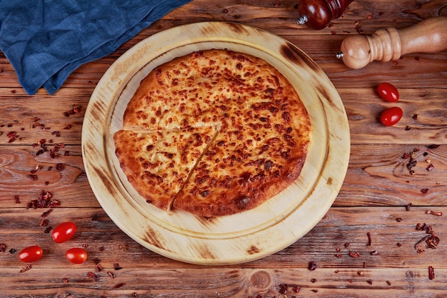 Khachapuri with cheese, traditional Georgian cuisine