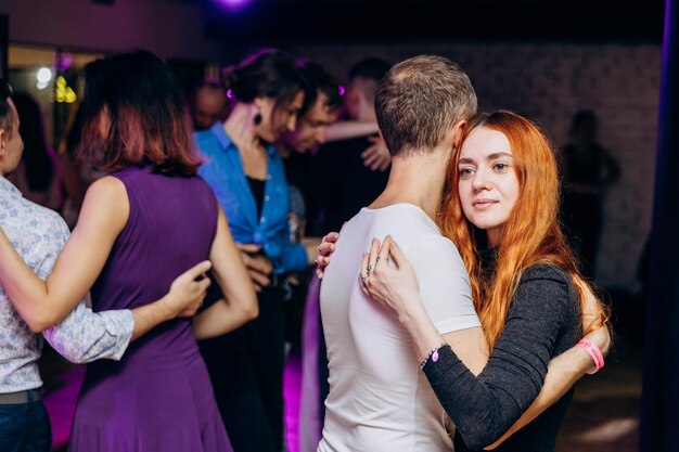 Kharkiv ukraine 110923 guy and girl are dancing bachata on dance floor social latin american eve