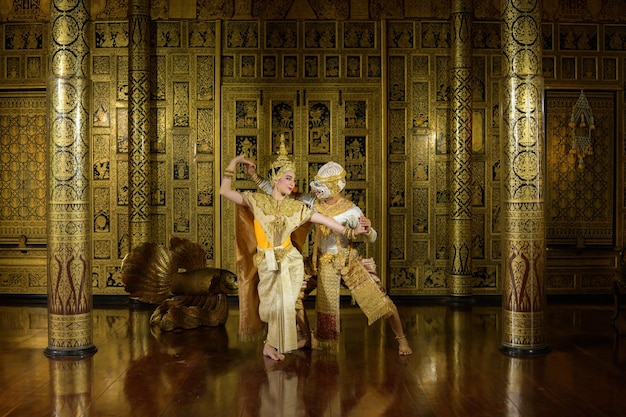 Photo khon is a classic thai dance in a mask this is hanuman expressing his love to miss suphan matcha