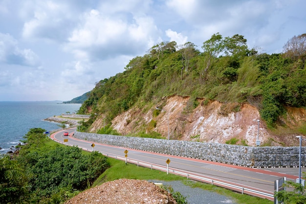 Khung Wiman Beach Chanthaburi Province Hills and beautiful sea views which are beautiful scenic spots in the eastern part of Thailand The red car is driving