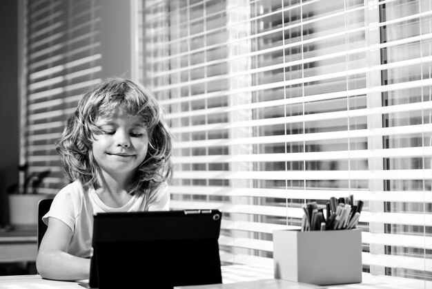 The kid boy ready to answer the online teachers question elearning homeschool and online education f