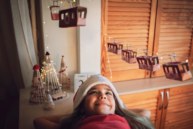 Kid by original advent calendar ski resort made with toilette
paper rolls magic christmas holiday