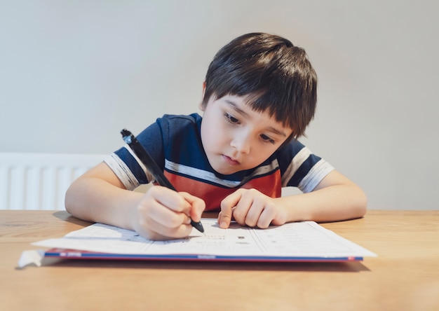 Kid doing his homework