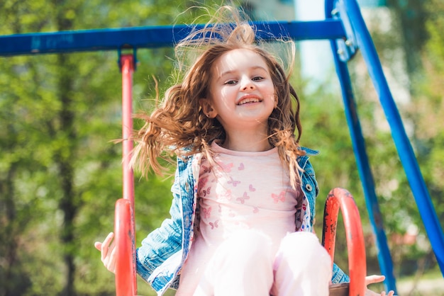 Kid enjoying ride in the park