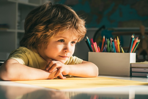 Kid gets ready for school Learning and education child concept School dream Daydreamer school child Dreams and imagination Dreamy school kid face