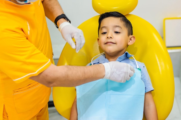 Kid getting prepared for dental treatment