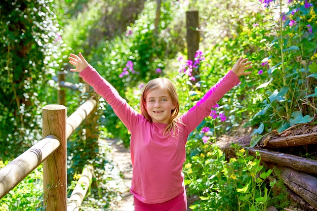 kid girl in spring track in Cuenca forest of Spain