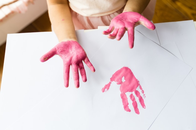 Kid hands and Handprint pink color