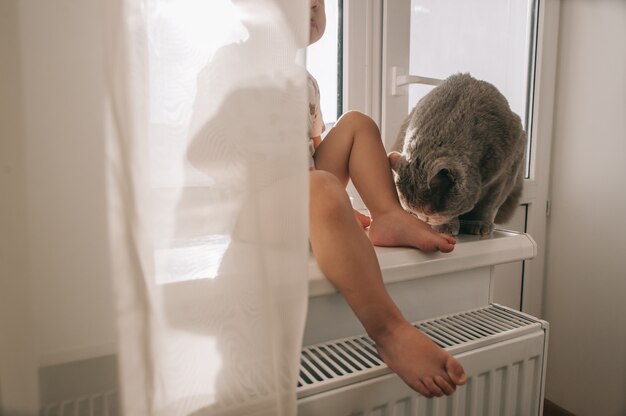 Kid and his pet cat