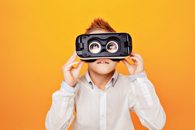 Kid looking through VR glasses