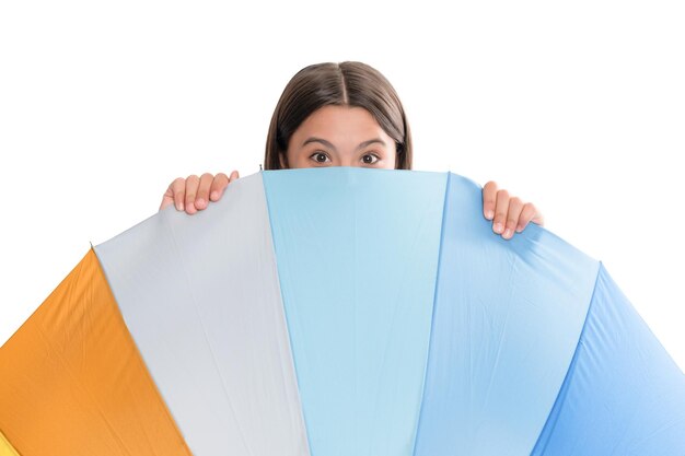 Photo kid behind multicolored rain protection parasol isolated on white background weather forecast