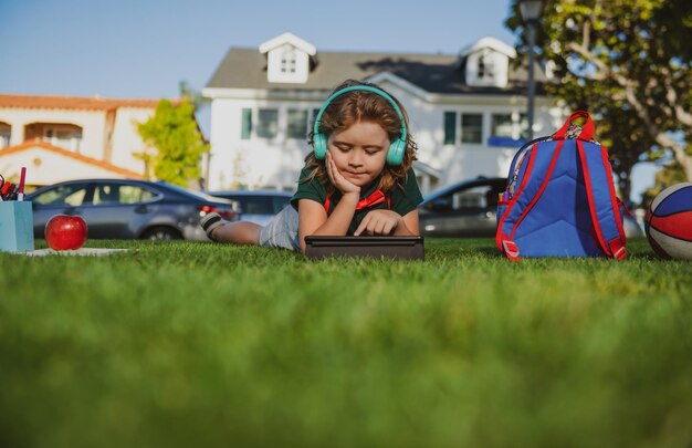 Kid outdoor education child doing homework outdoor nerd pupil