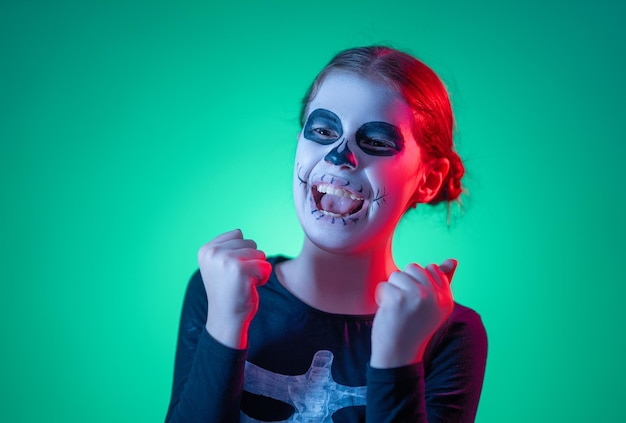 Kid at party in colorful lighting