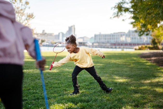 Kid playing outdoorns in the park