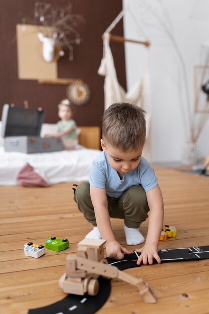 Photo kid playing in their room