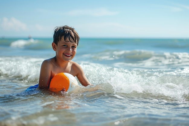 Kid playing with ball in the sea on summer vacation