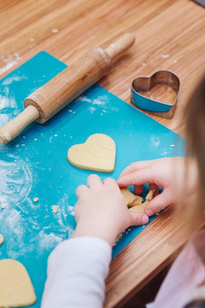 Kid taking part in baking workshop baking classes for children aspiring little chefs