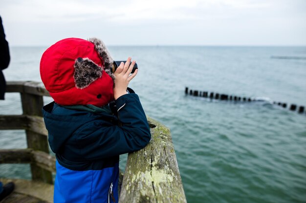 Kid watching the sea