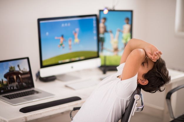 Kid working on computer