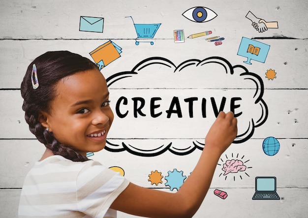 Kid writing creative doodles on white wood panel